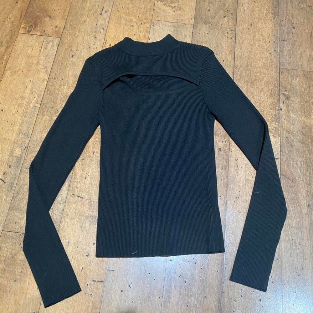 Forever 21 Black long sleeve top with cut out detail. Size: L